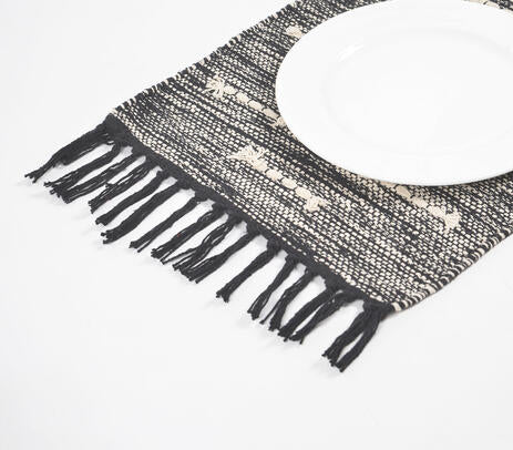 Handwoven tasseled placemats with tableware