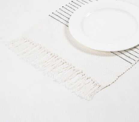 Minimal cotton placemats with tableware