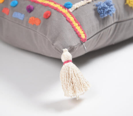 Abstract embroidered cushion cover paired with other cushions