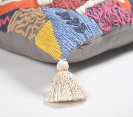 Colorful tasseled cushion lifestyle shot