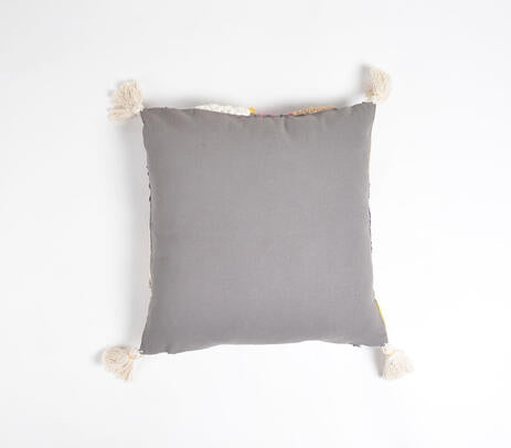 Colorful tasseled cushion detail shot