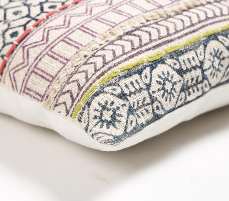 Block printed geometric cushion cover paired with other cushions