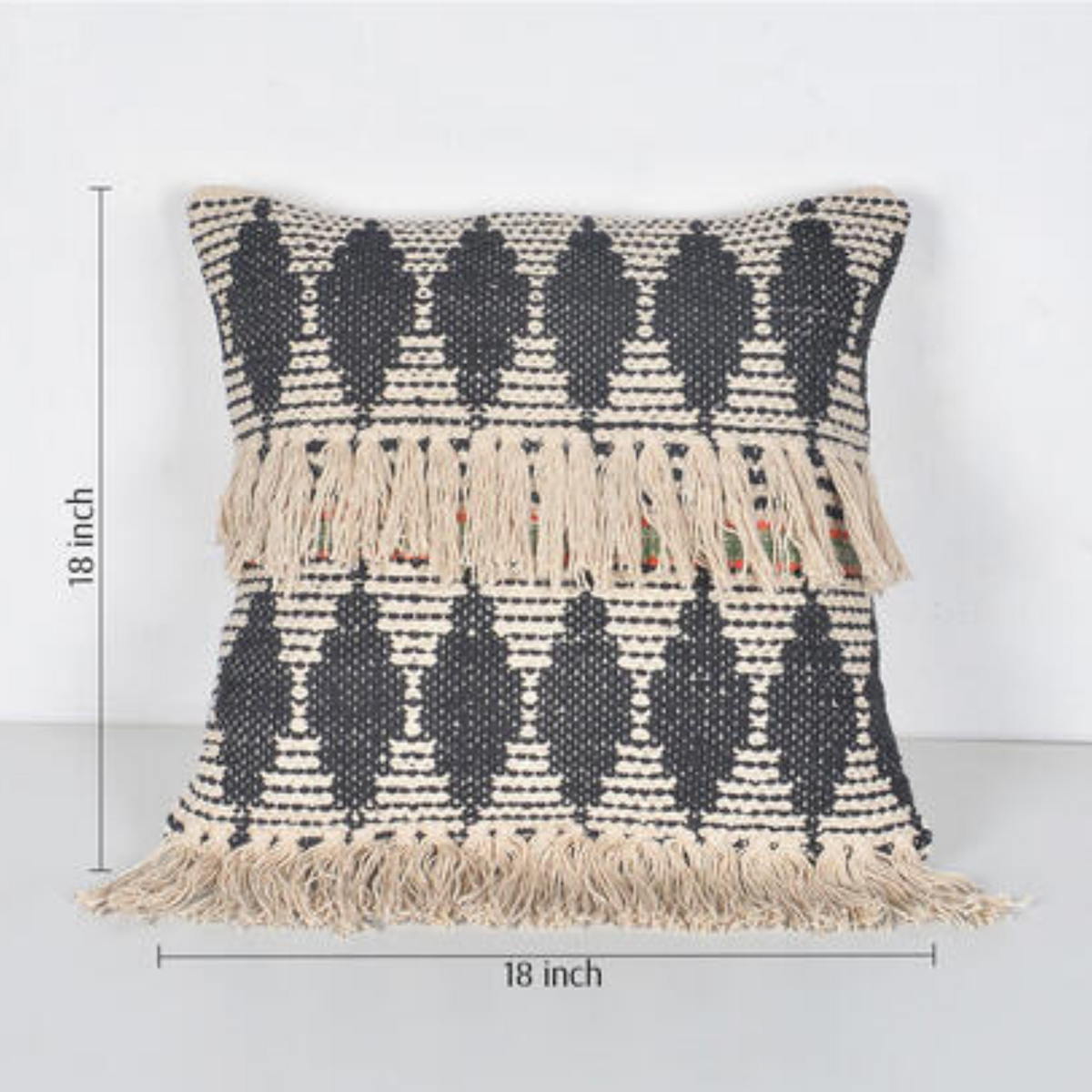 Textured tassel cushion cover detail close-up