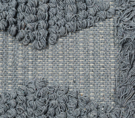 Overhead view of the tufted rug laid flat