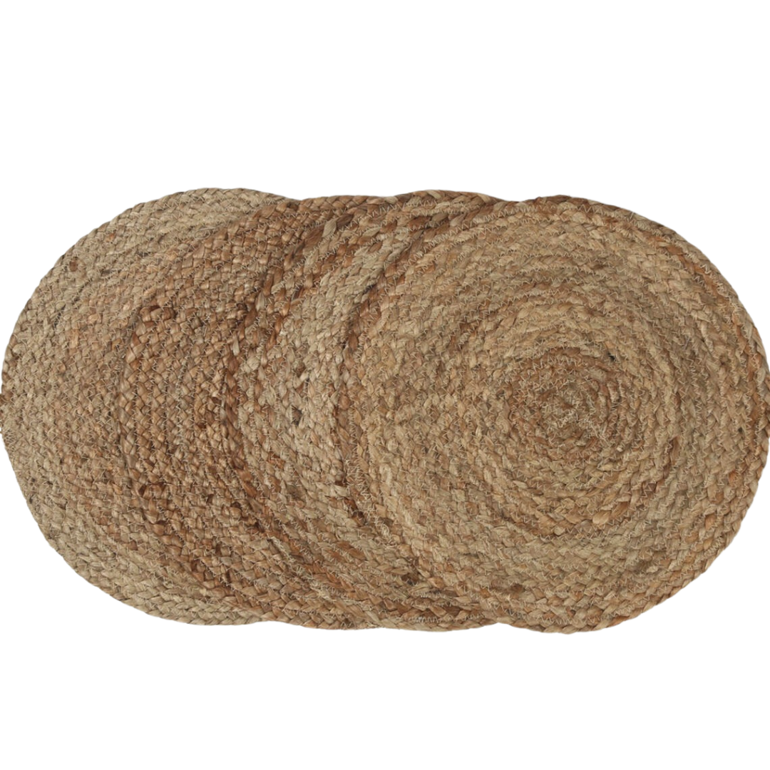 Round jute placemats on a dining table