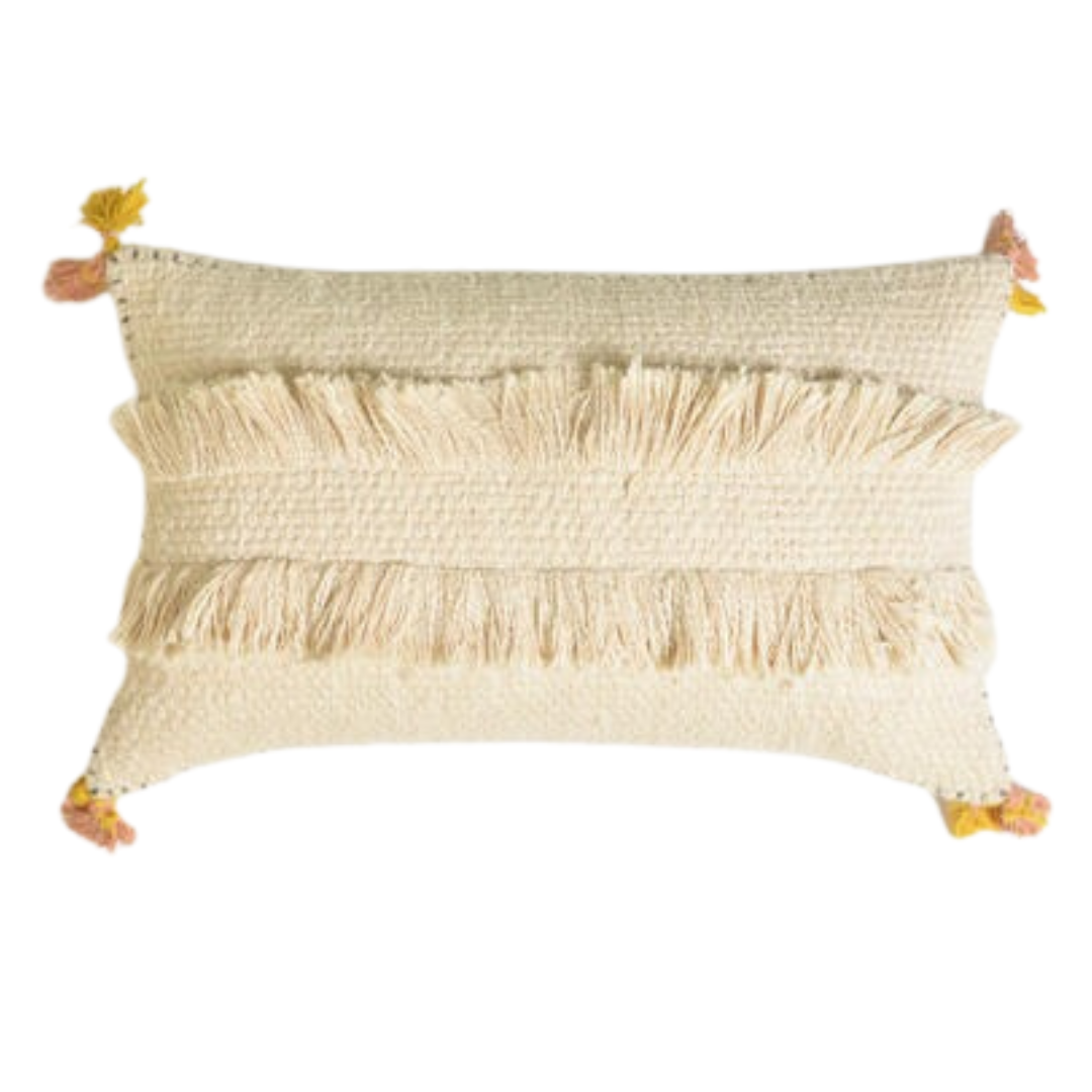 Fringed lumbar cushion cover paired with other cushions
