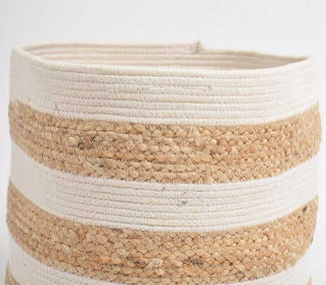 Braided storage basket styled in a room