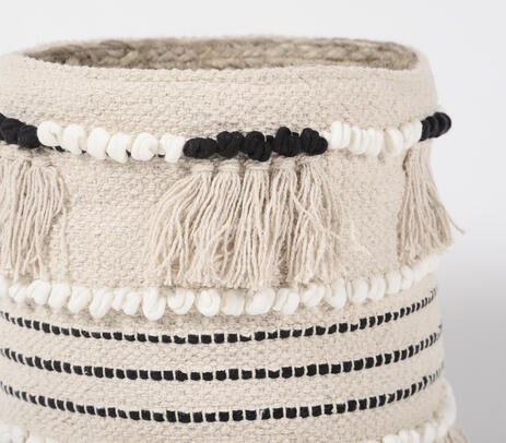 Fringed cotton basket close-up of top