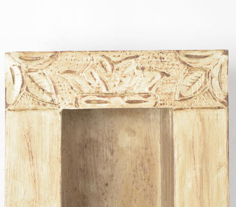 Jharoka wood wall frame above a console table