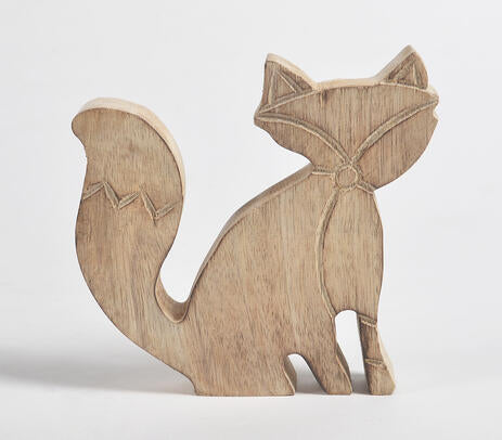 Wooden fox figurines back view
