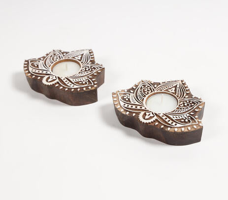Lotus tealight holders close-up of tribal-inspired carving