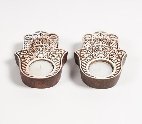 Wooden hamsa tealight holders close-up of carving detail