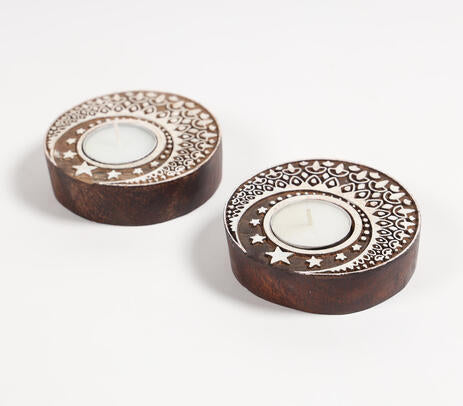 Wooden moon holders close-up of hand-carved crescent detail