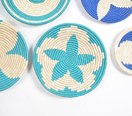 Teal sabai grass wall plates above a hallway console