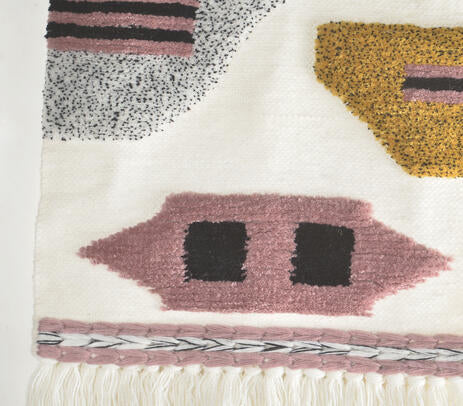 Handcrafted abstract wool wall hanging close-up of artisan work