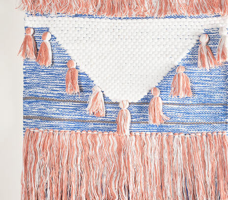 Mediterranean cotton wall hanging shown with hanging rod detail