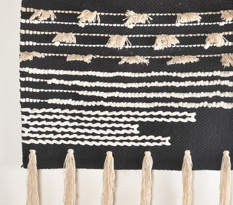 Textured cotton tassel wall hanging shown with hanging rod detail