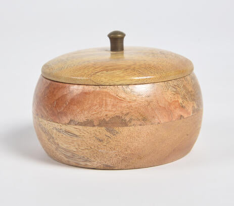 Wooden bowl with lid paired with tableware