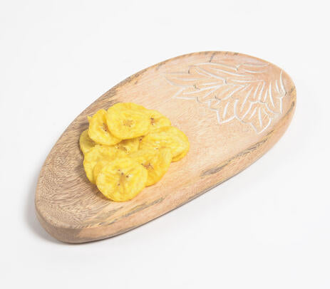 Mango wood serving platter paired with tableware