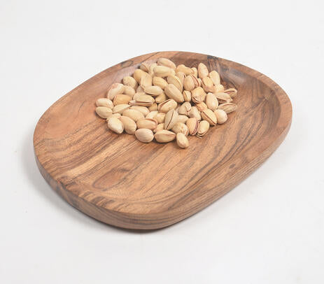 Acacia wood platter paired with tableware