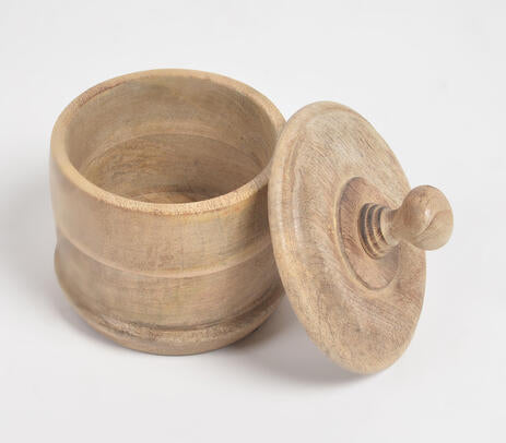 Round wooden jar with lid in place