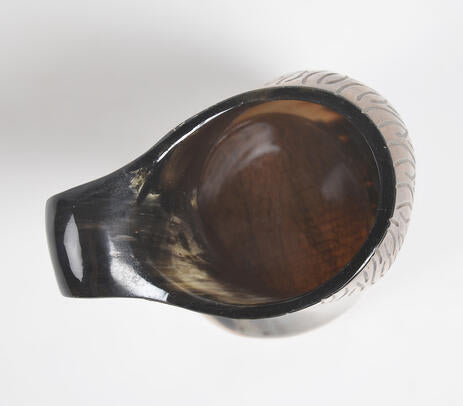 Horn water jug paired with tableware