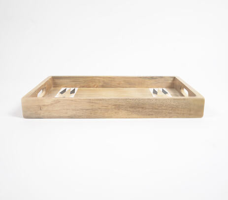 Handcut mango wood tray paired with tableware