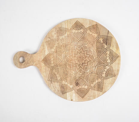 Engraved chopping board paired with kitchen items