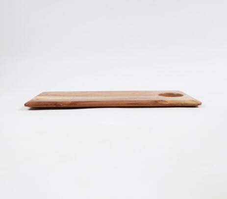 Classic acacia chopping board on a counter