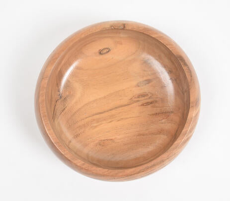 Acacia serving bowl paired with tableware