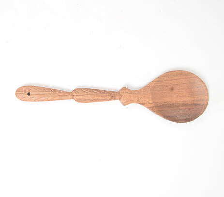 Acacia serving spoon lifestyle shot