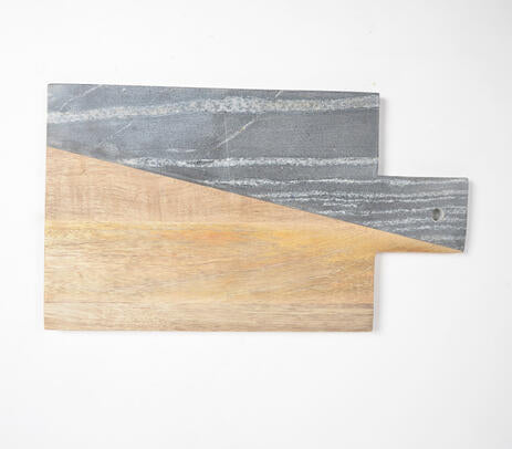 Wood and marble chopping board paired with kitchen items