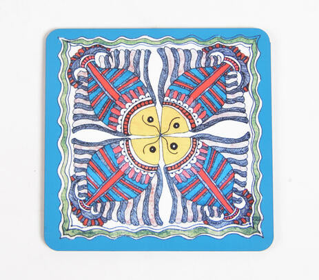 Madhubani coasters paired with tableware