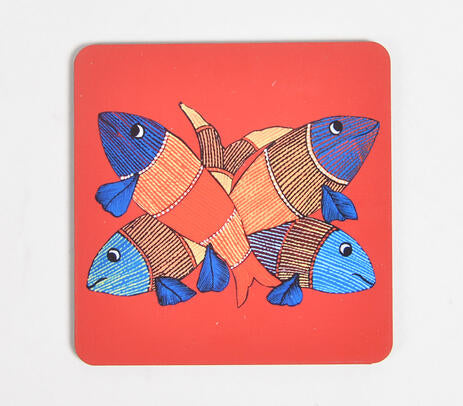 Madhubani fish coasters paired with tableware