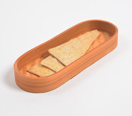 Bamboo serving tray paired with tableware