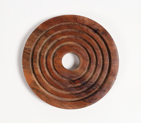 Round wooden coasters paired with tableware
