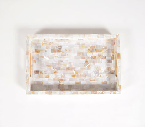Mother of pearl tray paired with decor