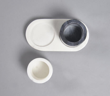 Marble condiment set in kitchen setting