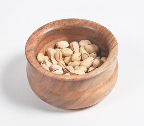 Acacia wood bowl paired with tableware