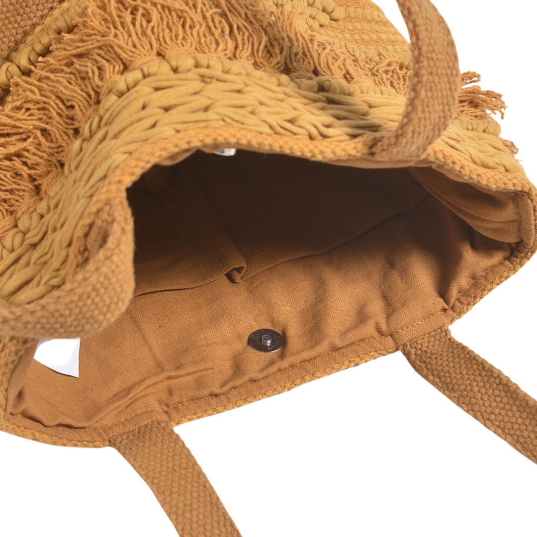 Honey tufted tote bag tassel close-up
