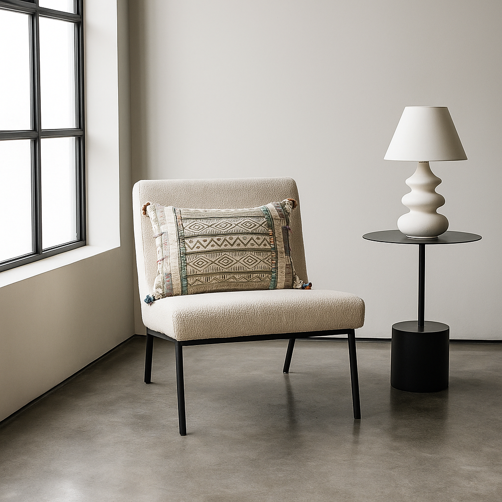 Pom pom lumbar cushion cover at an angle