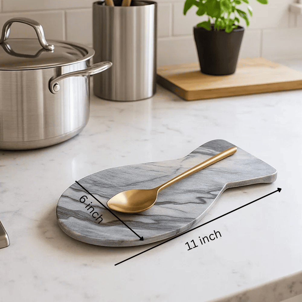 Grey marble spoon rest on stove