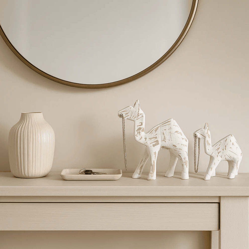 Wooden camel sculpture on a shelf
