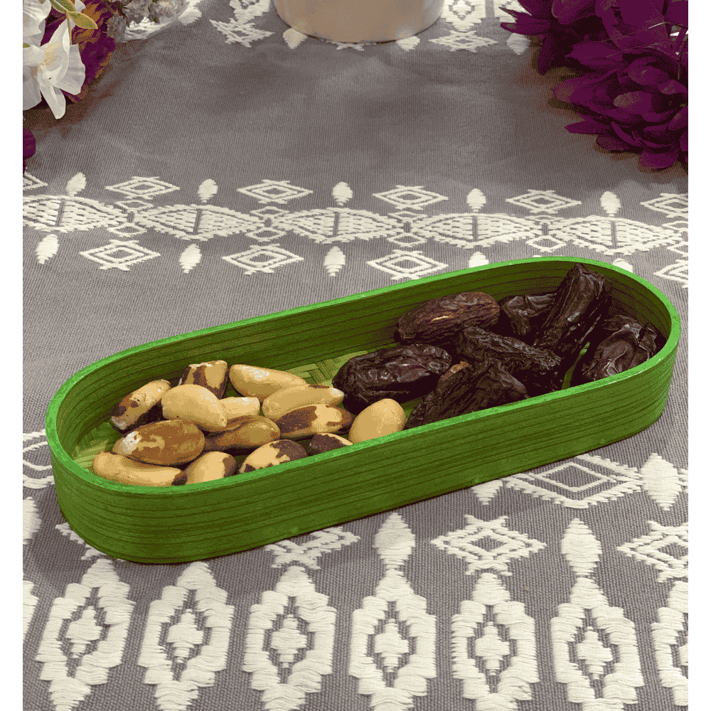 Green bamboo tray styled on a table