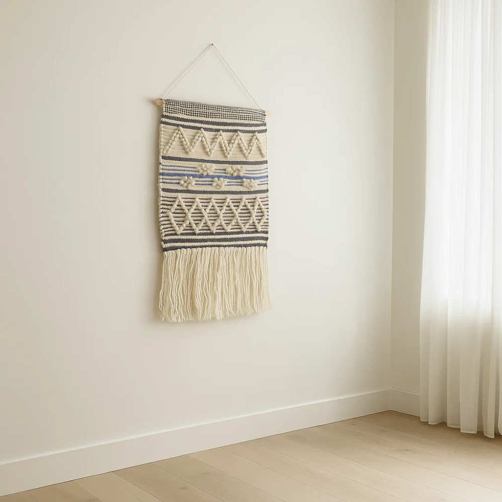 Geometric wool and cotton wall hanging close-up of woven pattern