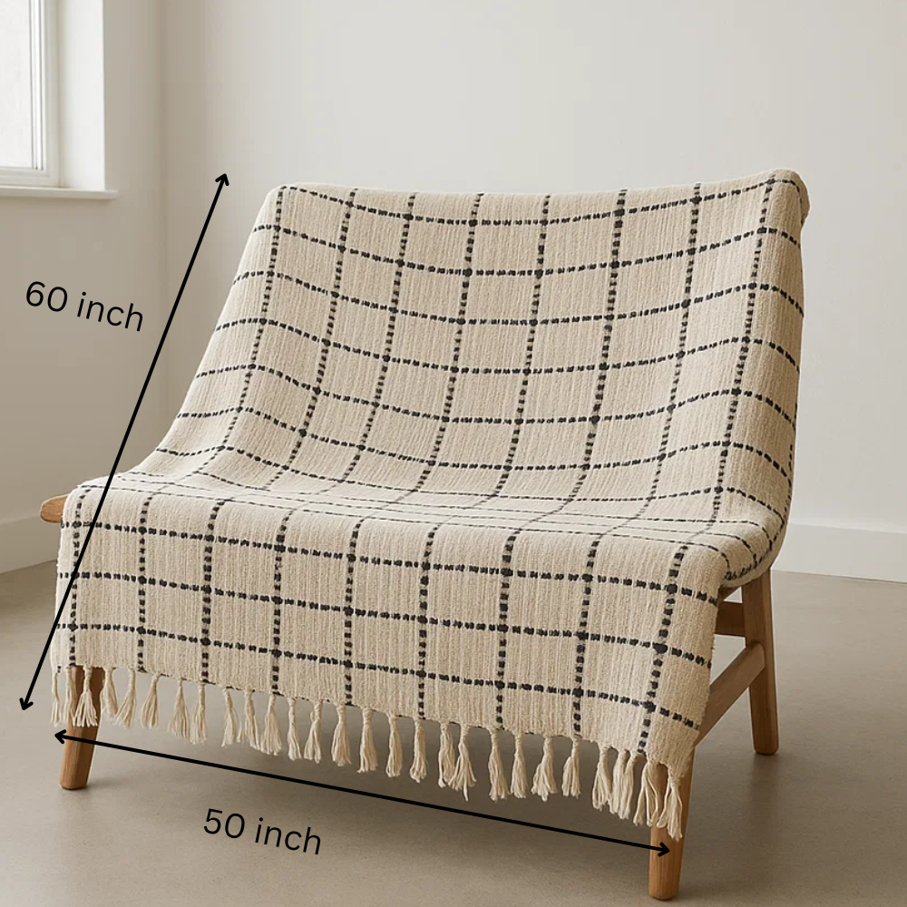 Checkered throw blanket tassel detail