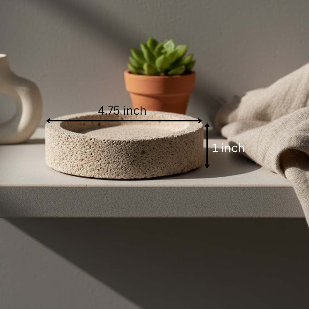Recycled concrete soap dish on bathroom vanity