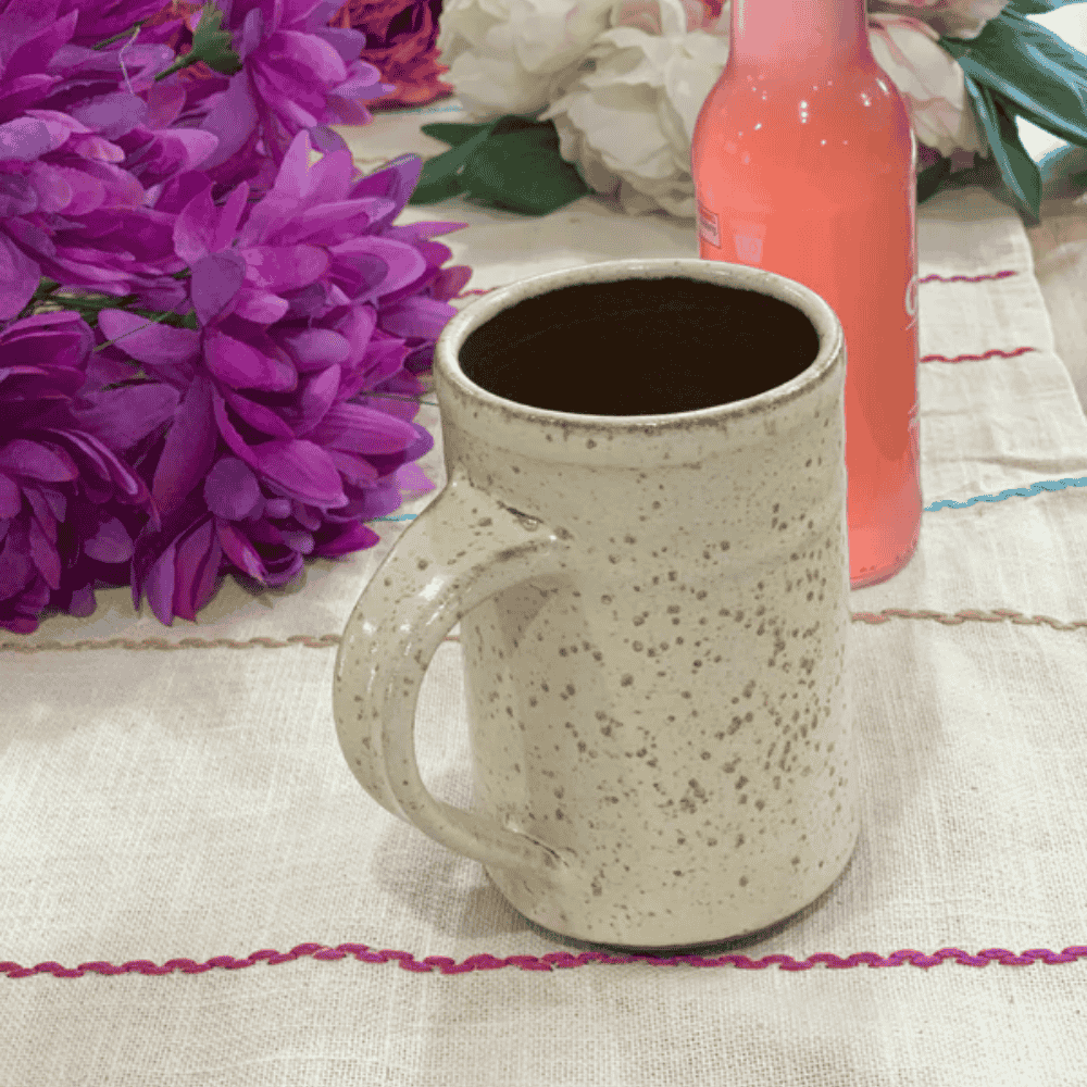Clay beer mug with beer
