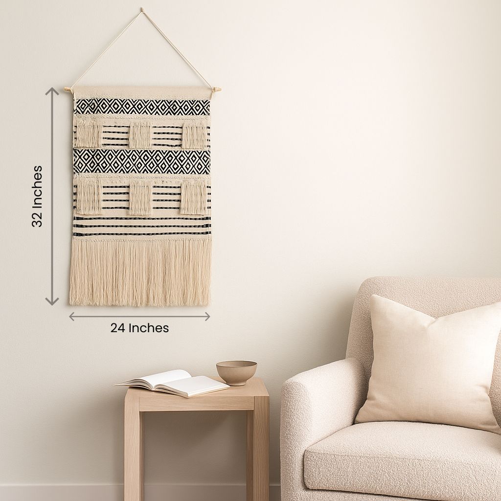 Small geometric cotton fringe wall hanging shown at an angle for depth