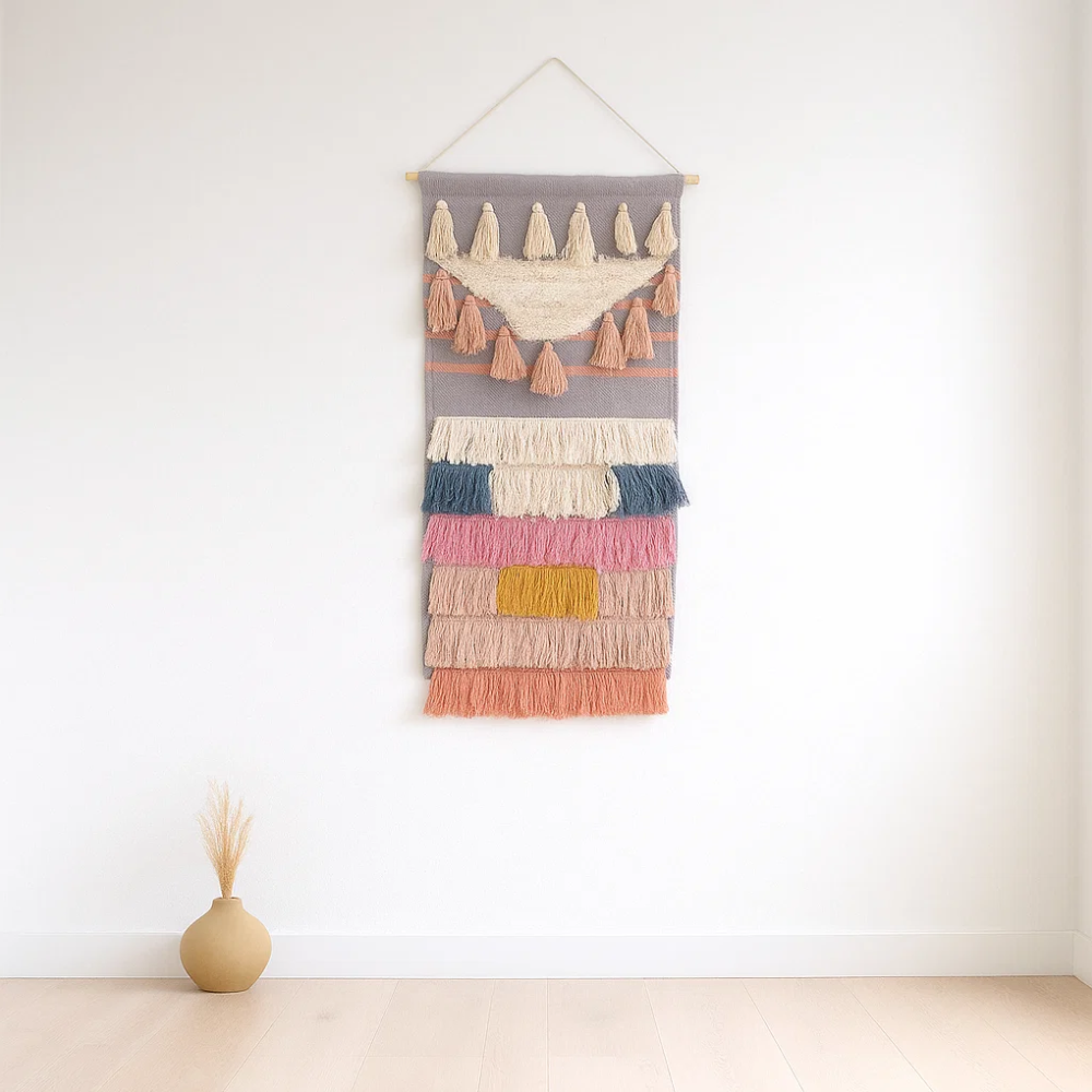 Pastel wool and cotton wall hanging detail of fringe